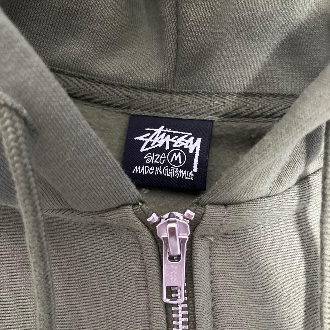 Stussy オリーブ パーカー M - メルカリ