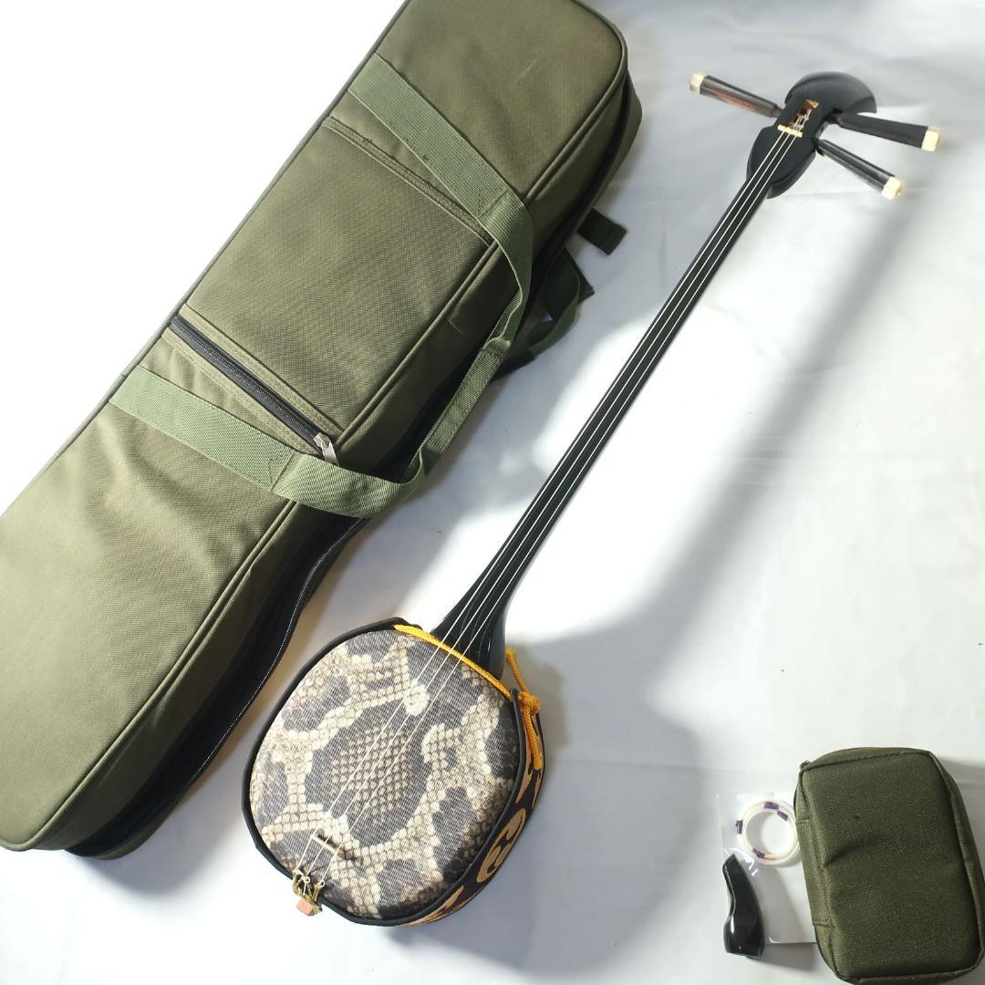 美品 沖縄三線 ケース付 爪 予備弦 付属 和楽器
