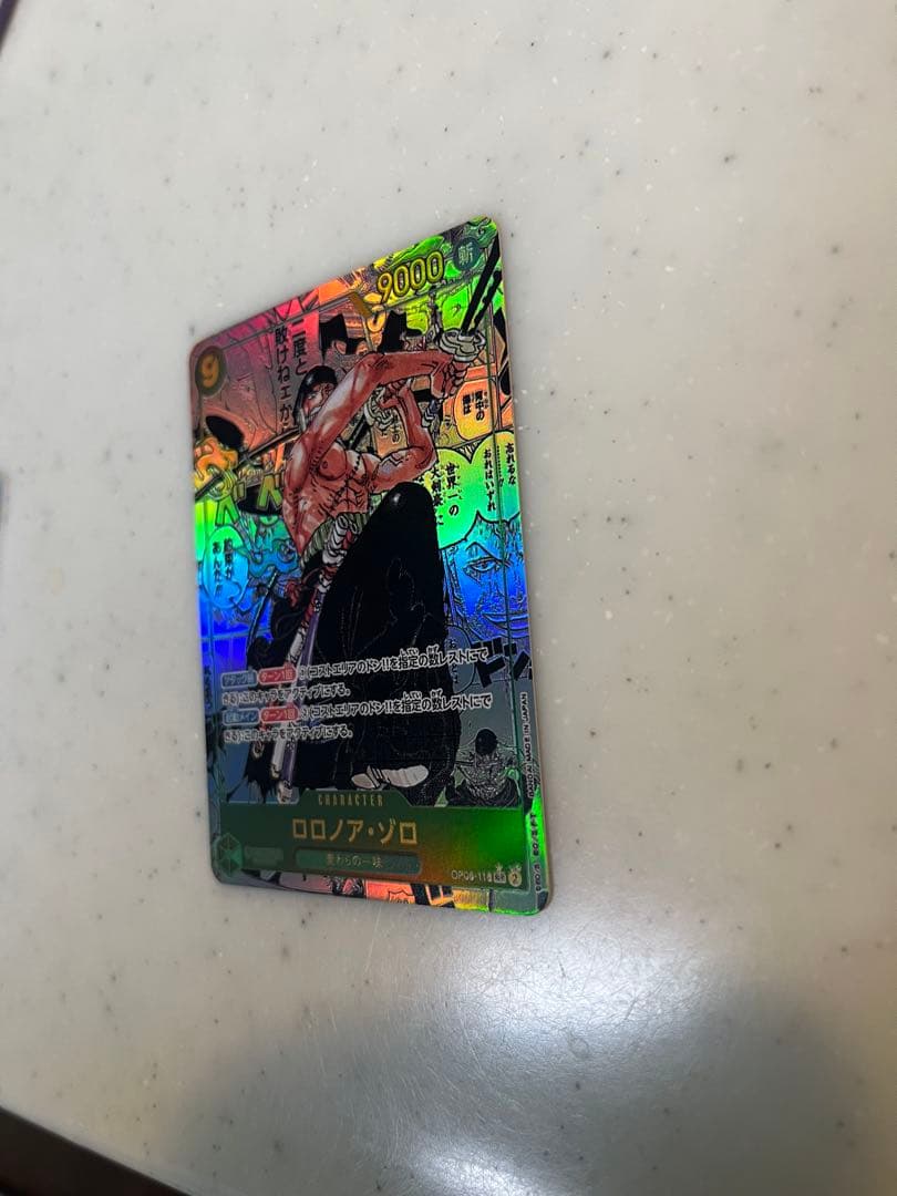 ロロノア・ゾロ SEC スーパーパラレル(コミパラ) OP06-118 - メルカリ