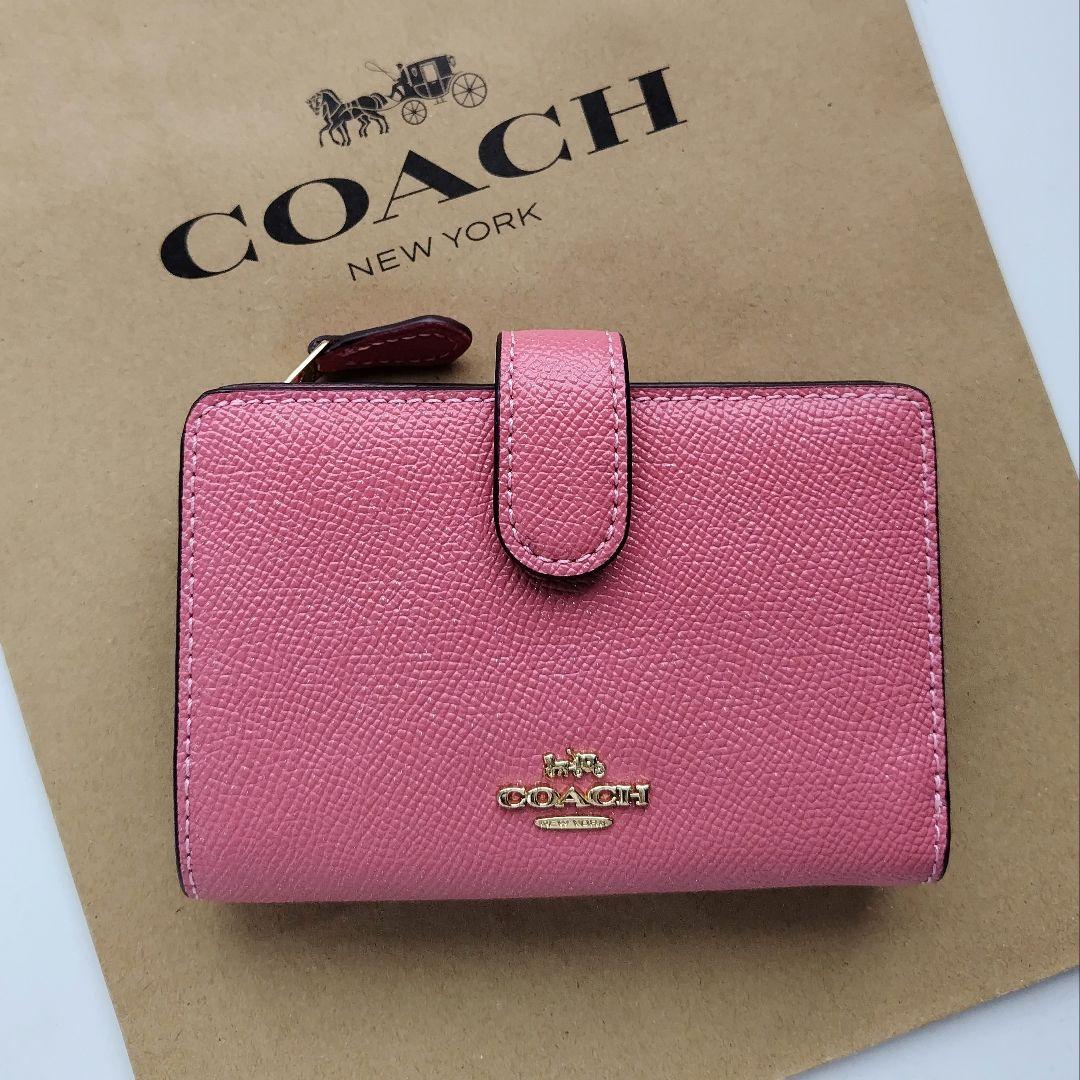 【新品】COACH コーチ 二つ折り財布 シグネチャー ピンク　レザー