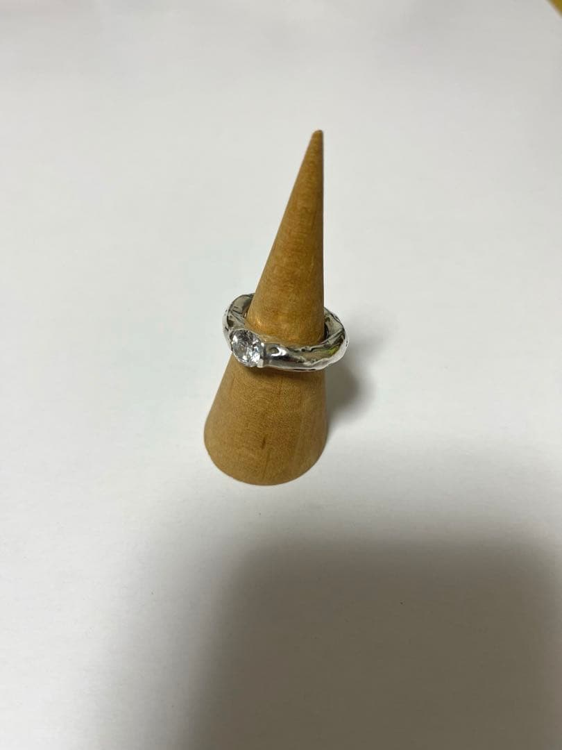 e.m. ジルコニア1粒埋め込みリング☆イーエム 中古・古着通販】e.m. (イーエム) ジルコニア埋め込みリング シルバー