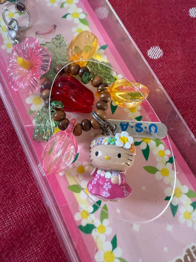 ハローキティストラップ　ハワイ　USA ご当地キティ　ハイビスカス　日焼けキティ