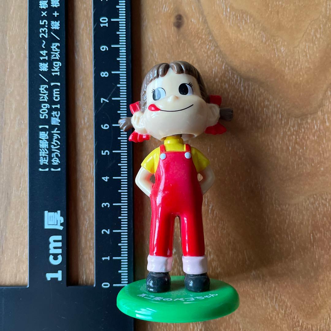 不二家のペコちゃん 首振り人形 - メルカリ