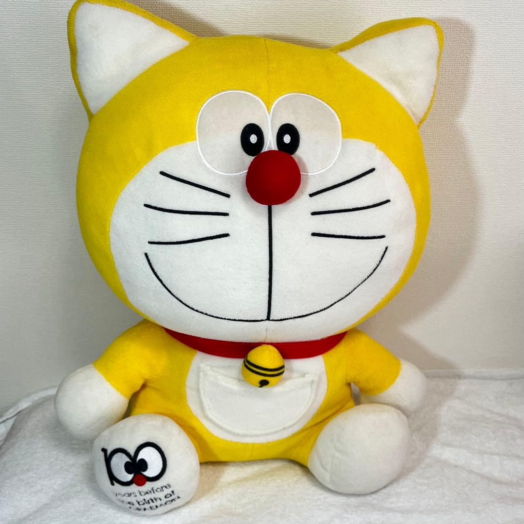希少】生誕100年前ぬいぐるみ 黄色 ドラえもん - メルカリ