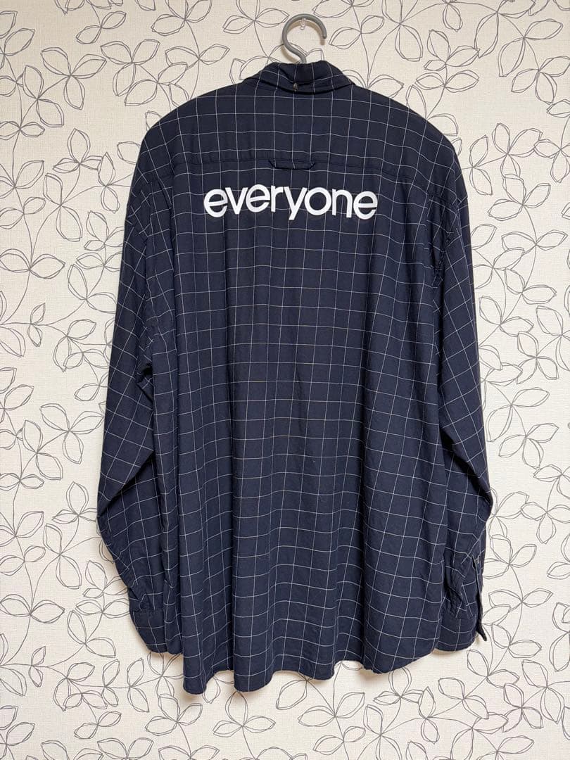 everyone back logo check down shirt - メルカリ