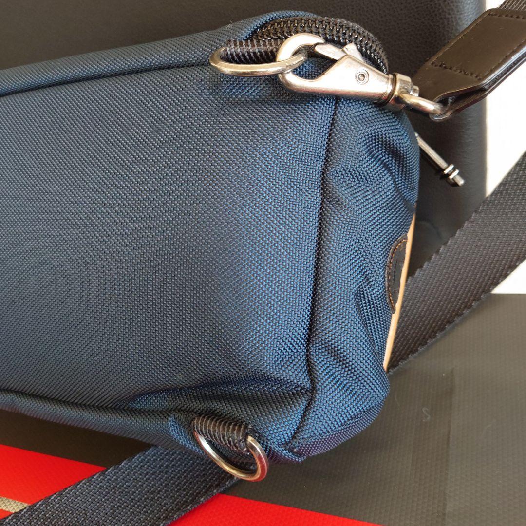 正規品超美品】TUMI 232399NVYRE ケリー スリングバッグ - メルカリ