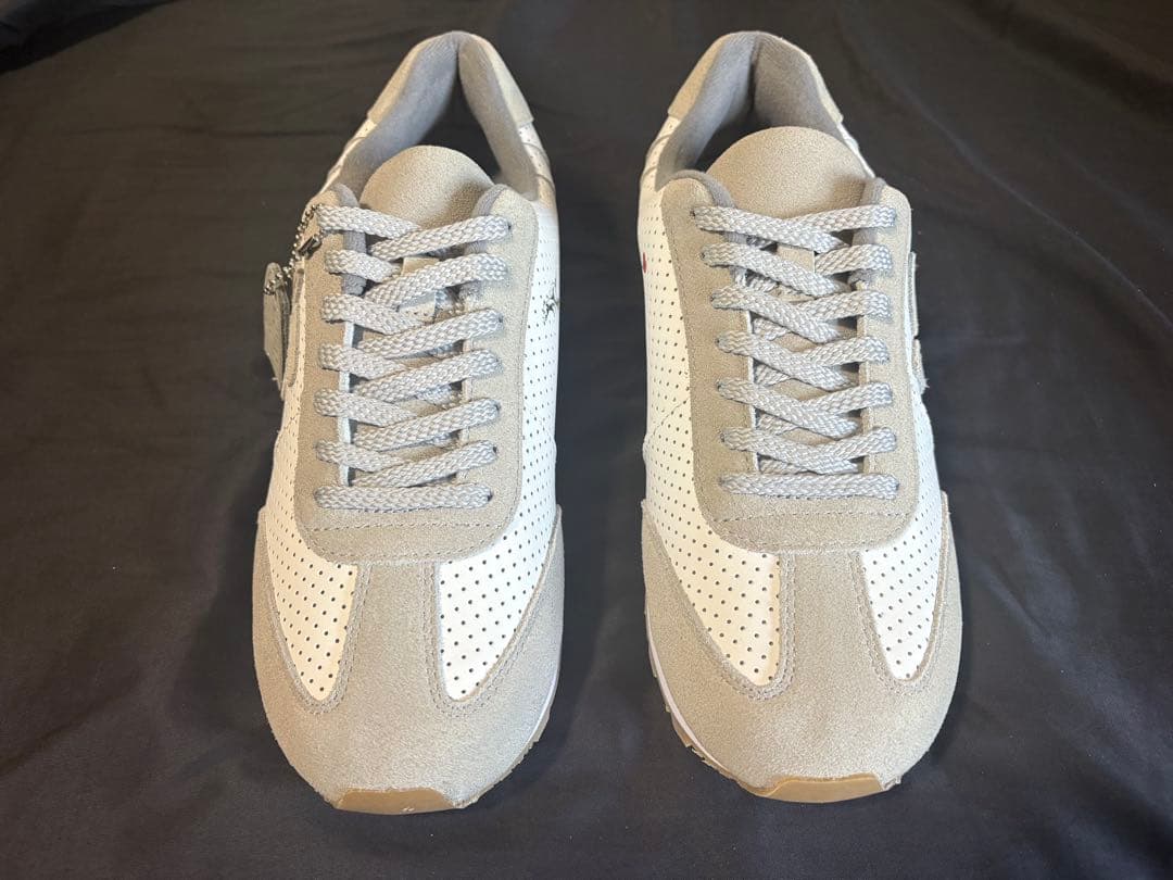 にゅ～ず MOMBRANDALISEDスニーカー バンクシー - メルカリ