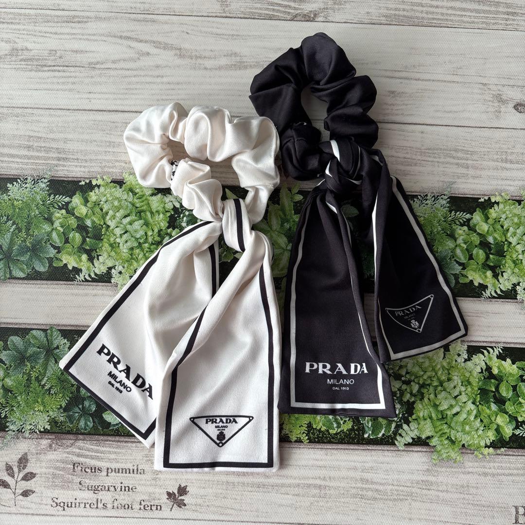 PRADA ブラックリボンシュシュ ホワイトリボンシュシュ - メルカリ