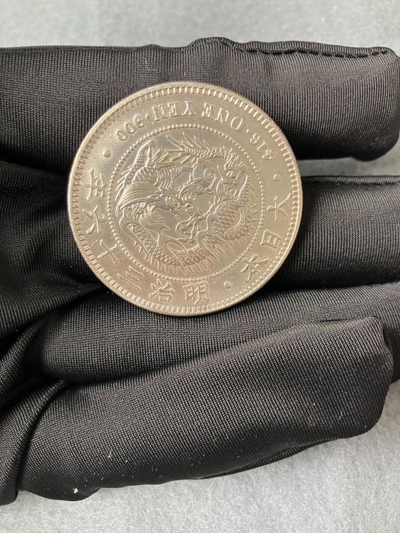 本物保証】新一円銀貨 竜 明治三十六年 一圓銀貨 未使用- - メルカリ