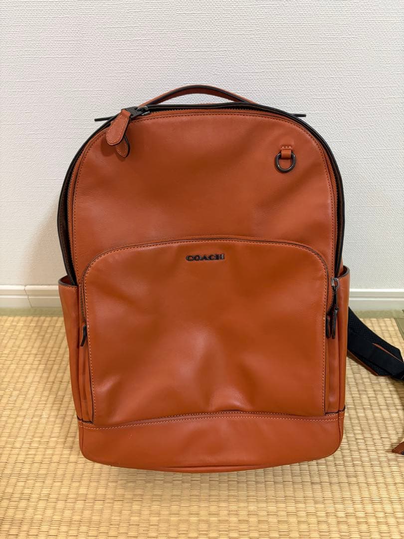 COACH オレンジレザーリュック