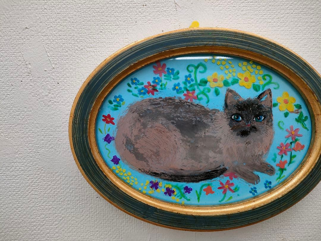 楕円の額入り　ガラス絵「野原の青い目の猫くん」