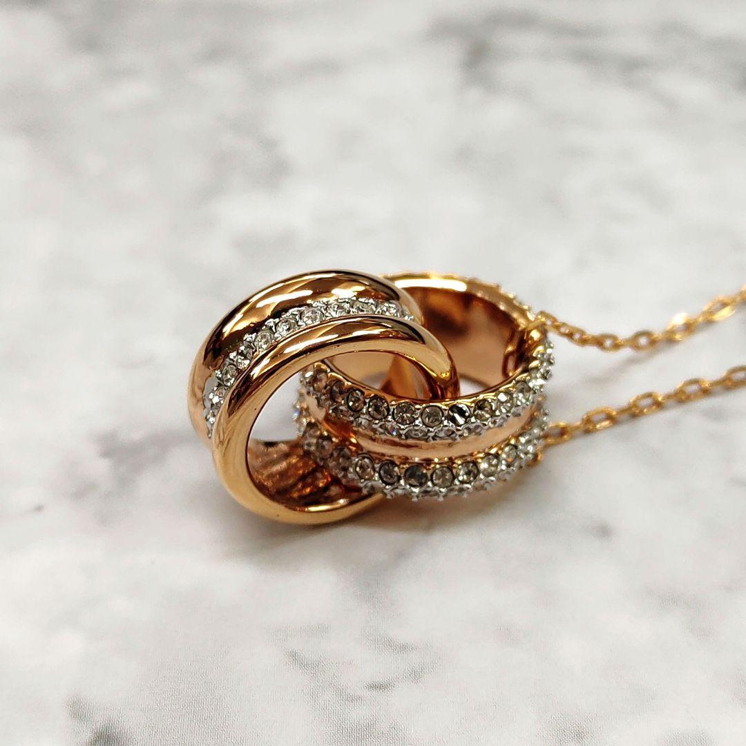 スワロフスキー SWAROVSKI ダブルリング ネックレス ゴールド - メルカリ