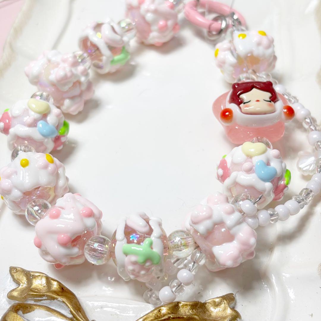 スイーツモチーフの携帯ストラップ ペイントビーズ sp スカルパンダ