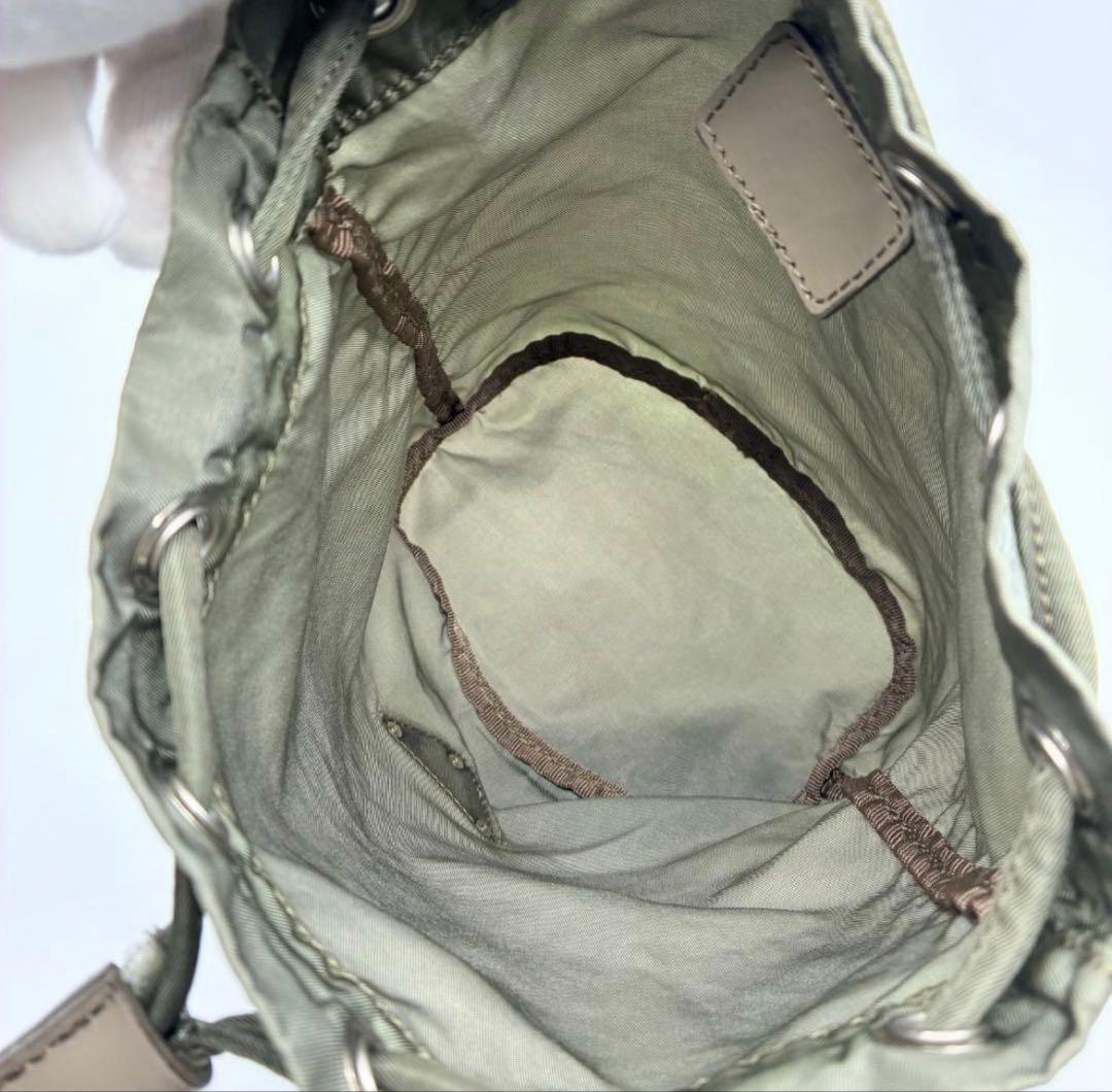 PRADA プラダ 巾着ポーチ カーキ A1362A2 - メルカリ