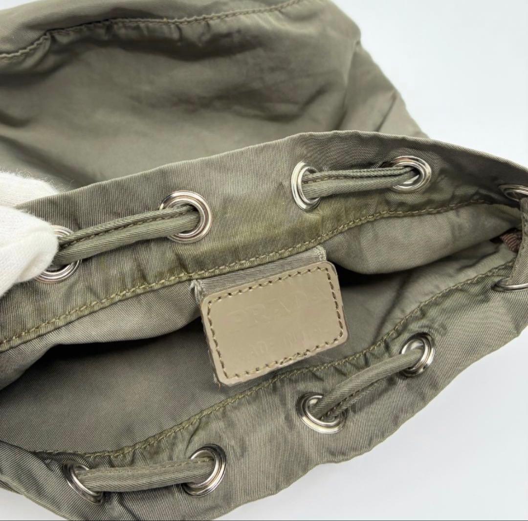 PRADA プラダ 巾着ポーチ カーキ A1362A2 - メルカリ