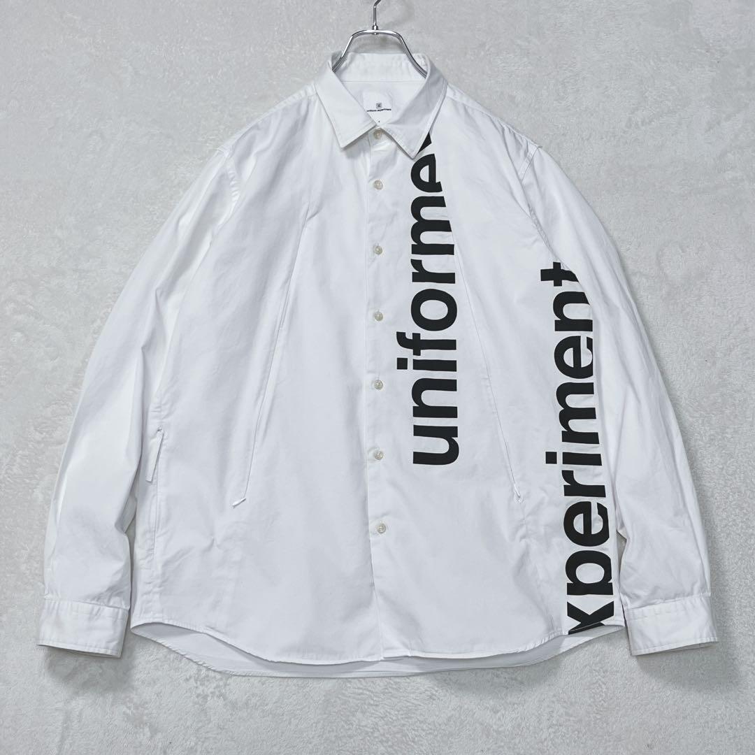 『ユニフォームエクスペリメント』オーバーサイズシャツ ジップポケット プリント