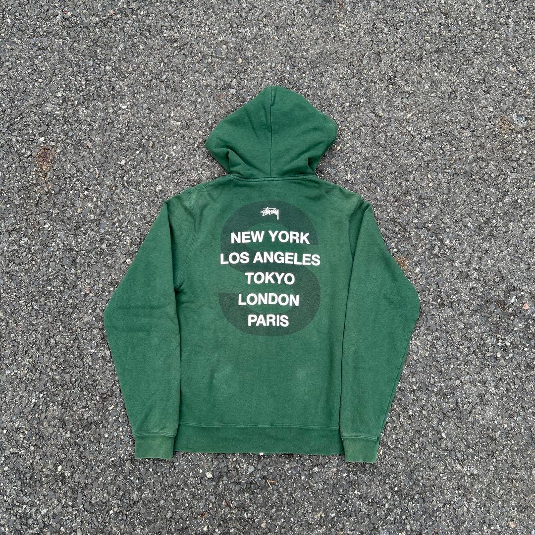 人気】stussy ジップパーカー グリーン ワールドツアー - メルカリ