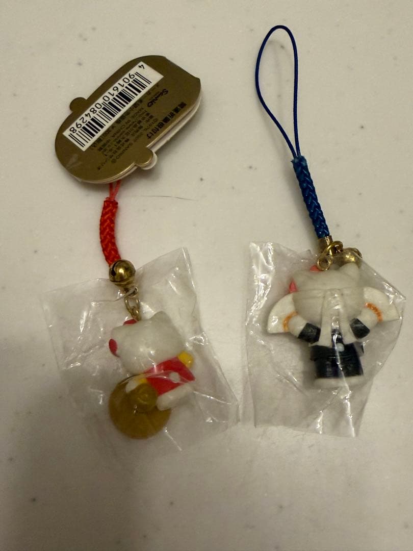 ハローキティ 開運祈願根付けストラップ (太鼓判、必勝請負猫) - メルカリ