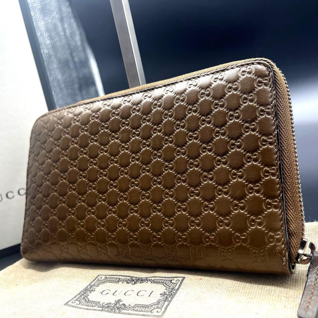グッチ 長財布 オーガナイザー ラウンドファスナー マイクロシマ GG柄 茶