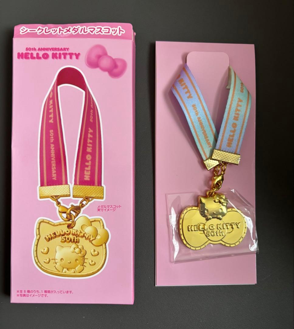 ハローキティ 50周年記念メダル ゴールド - メルカリ