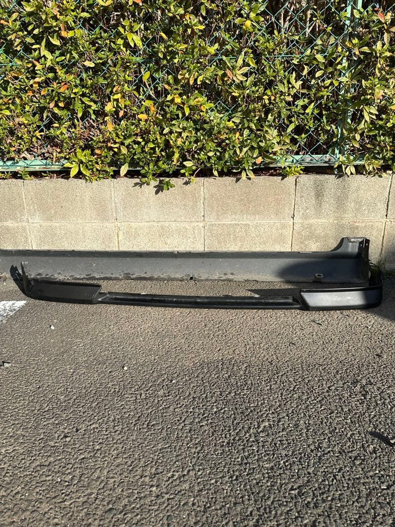 ラパンSSHE21S フロントリップスポイラーとサイドステップ左右ヒビ複数あり黒