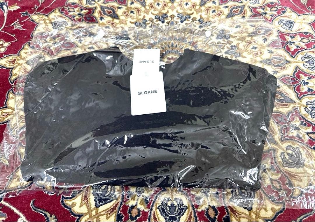 新品タグ付き 佐藤佳菜子 肩で魅せる半袖ニット 黒boutique310 - メルカリ