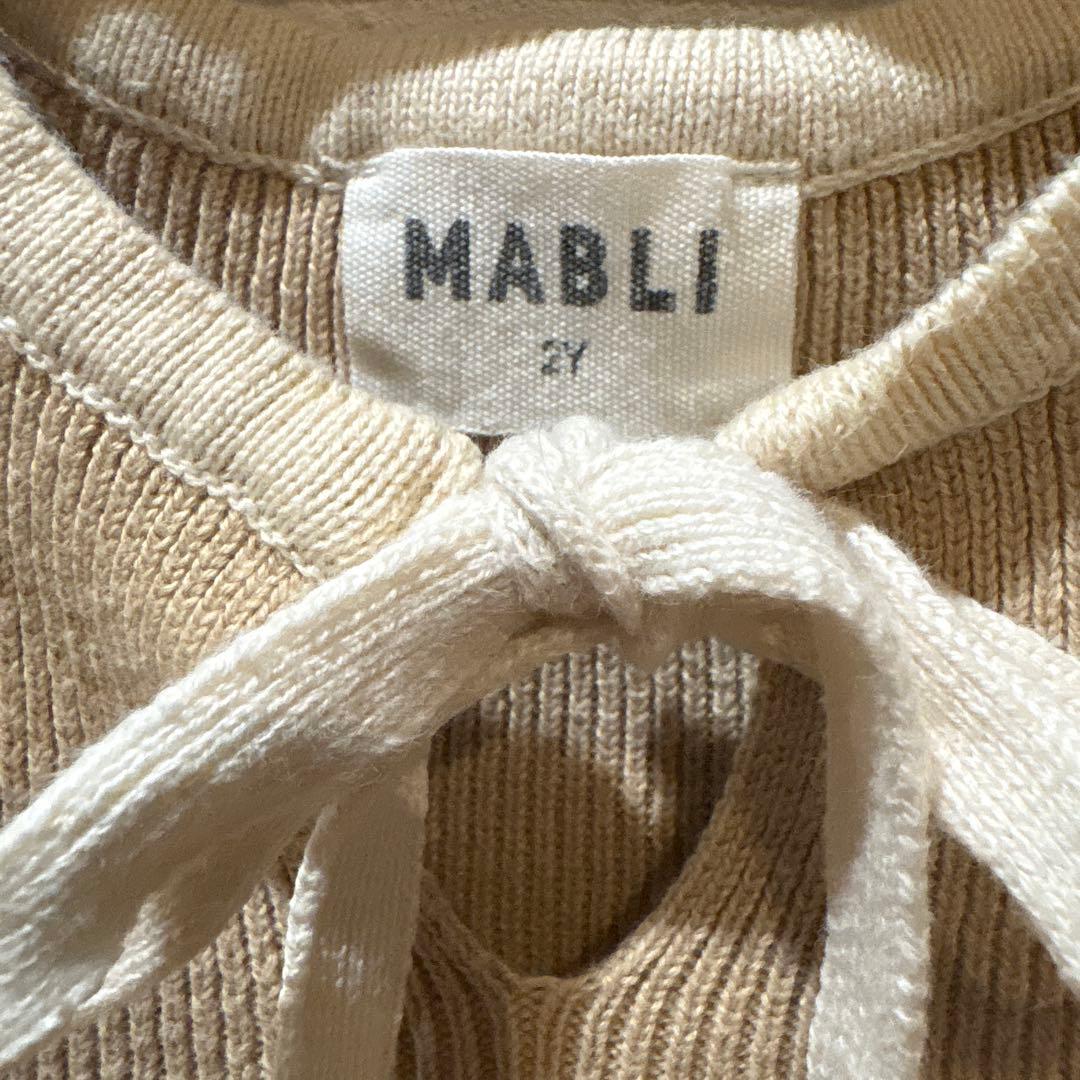 MABLI ベージュ フリル袖ロンパース - メルカリ