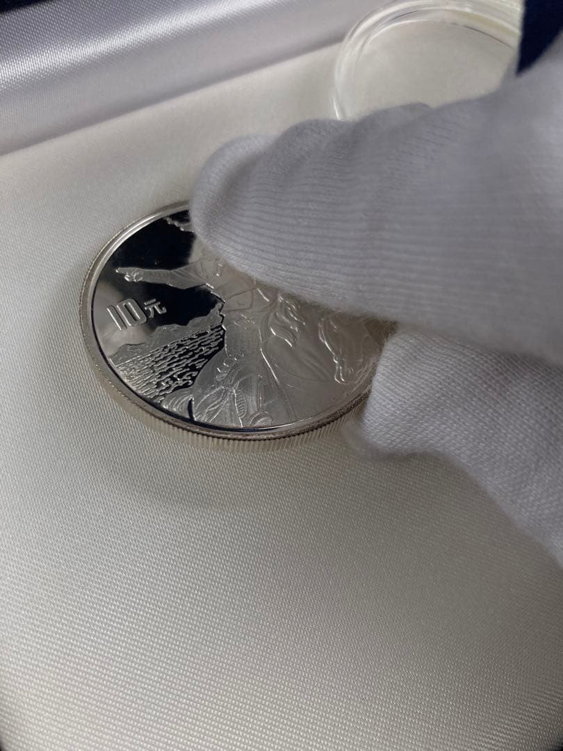 三国志 記念硬貨4枚セット 1995年 鑑定書ナンバー付き - メルカリ