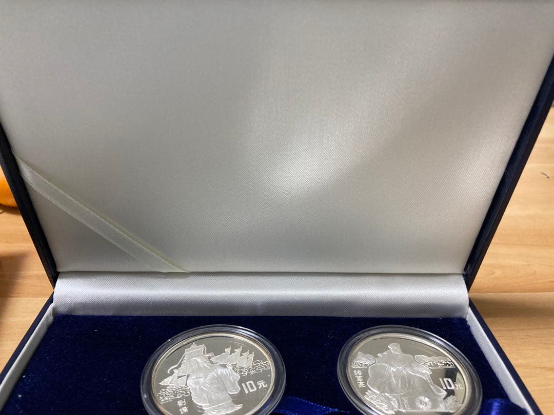 三国志 記念硬貨4枚セット 1995年 鑑定書ナンバー付き - メルカリ