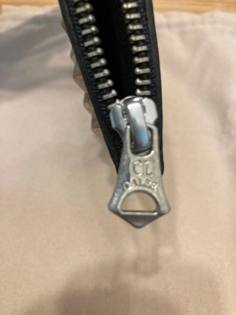 calee キャリー スタッズポーチ 巾着袋付き