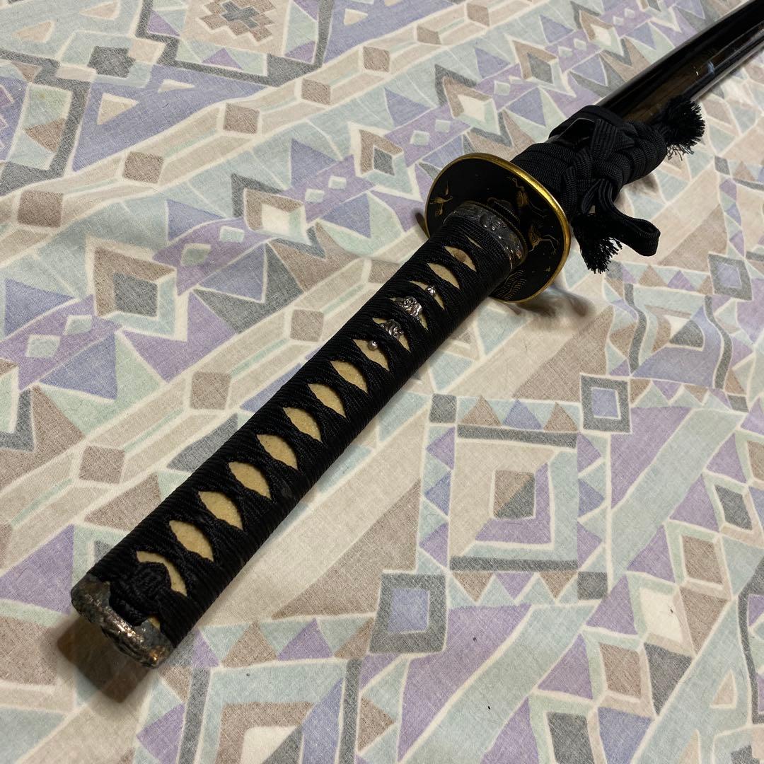 上級居合刀 黒柄 鶴波図楕円鍔 黒呂鞘