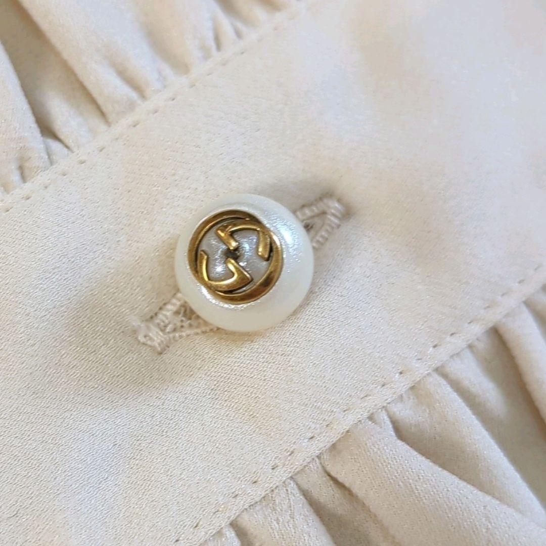 新品同様☆GUCCI☆GGパールボタン☆ボウタイ☆フリルブラウス☆ - メルカリ