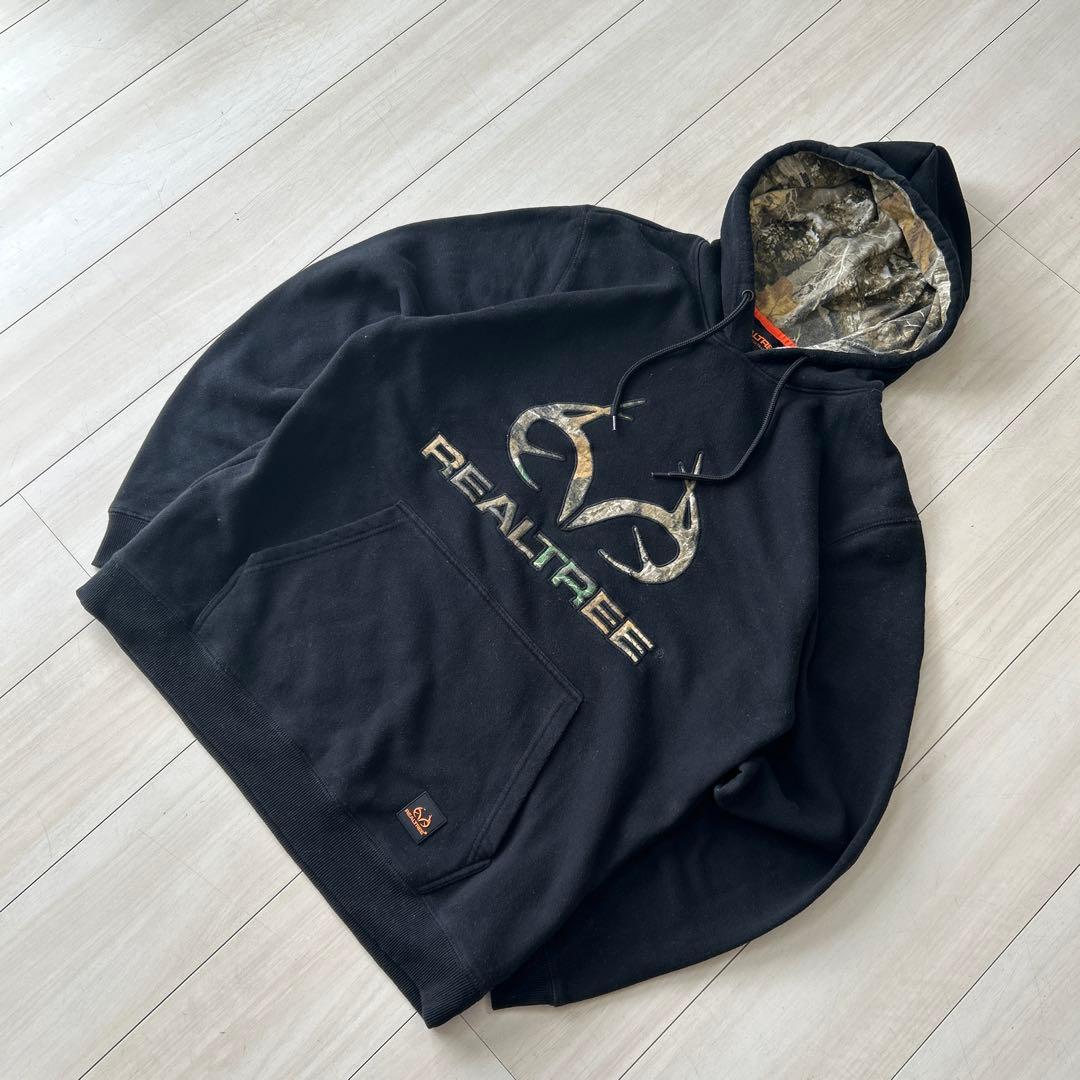 REALTREE リアルツリー カモ柄ロゴ パーカー 黒 XL相当 - メルカリ