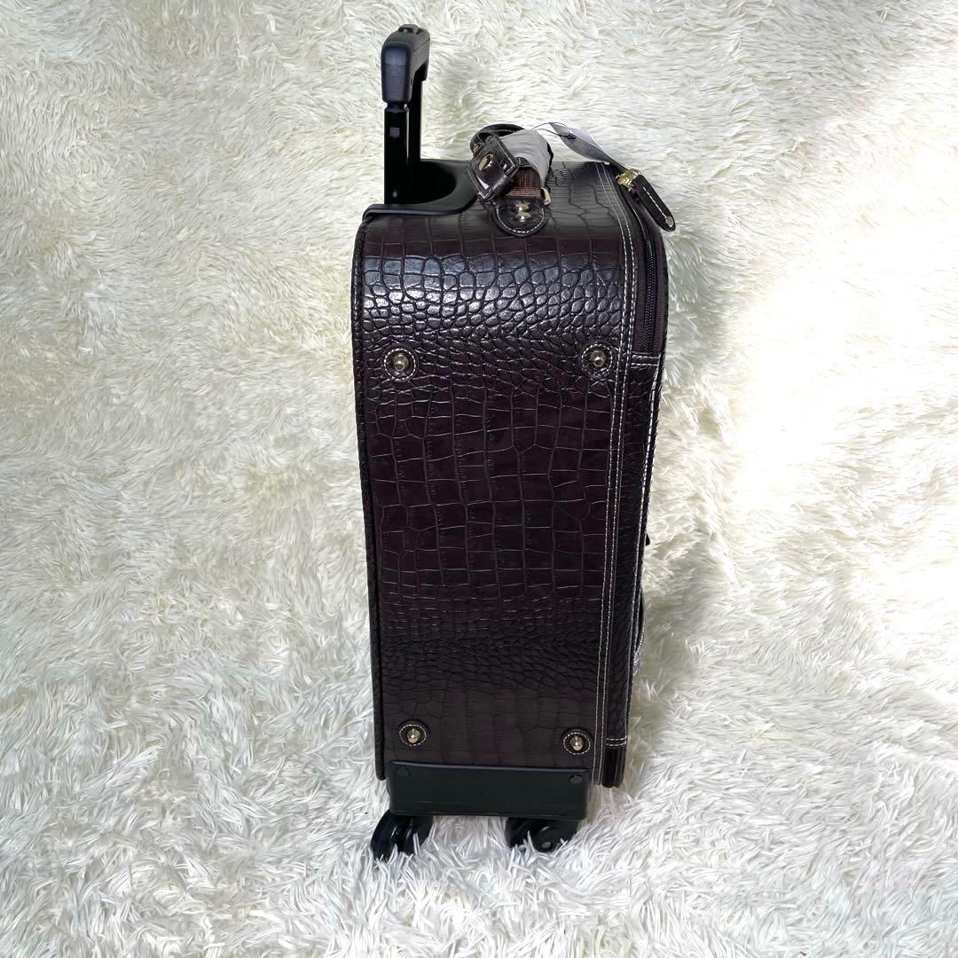 SWANY スワニー クロコ型押し キャリーバッグ ダークブラウン - メルカリ