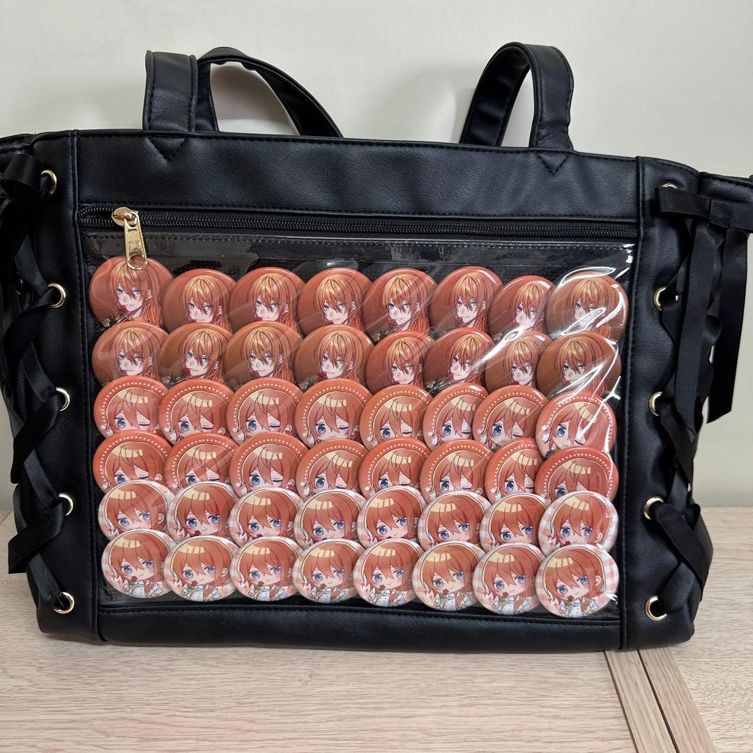 うたプリ缶バッジ48個つき痛バッグ - メルカリ