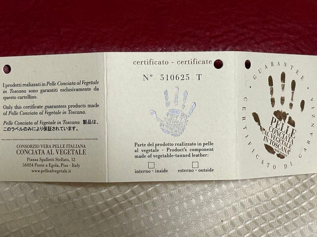 新品未使用 pomerance ポメランジェ 赤 長財布 スタッズ ストーン