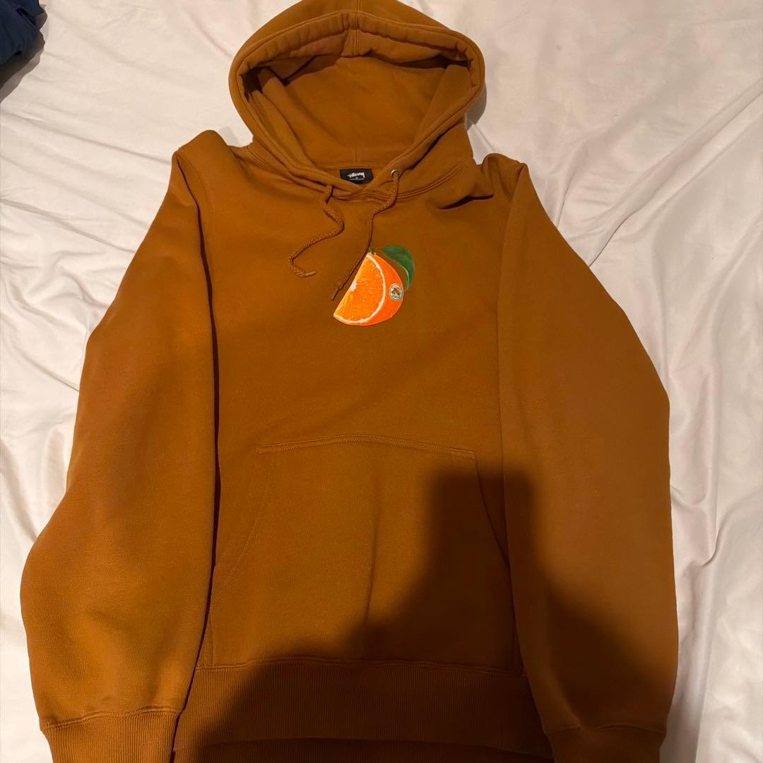Stussy オレンジブラウンパーカー M - メルカリ