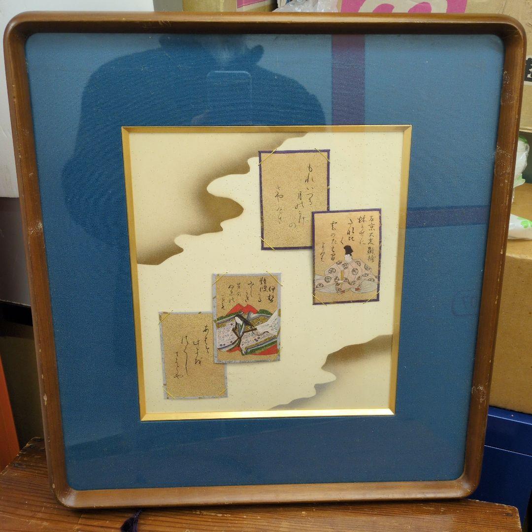 百人一首の古いカルタが読札と絵札のセットでマウントされています
