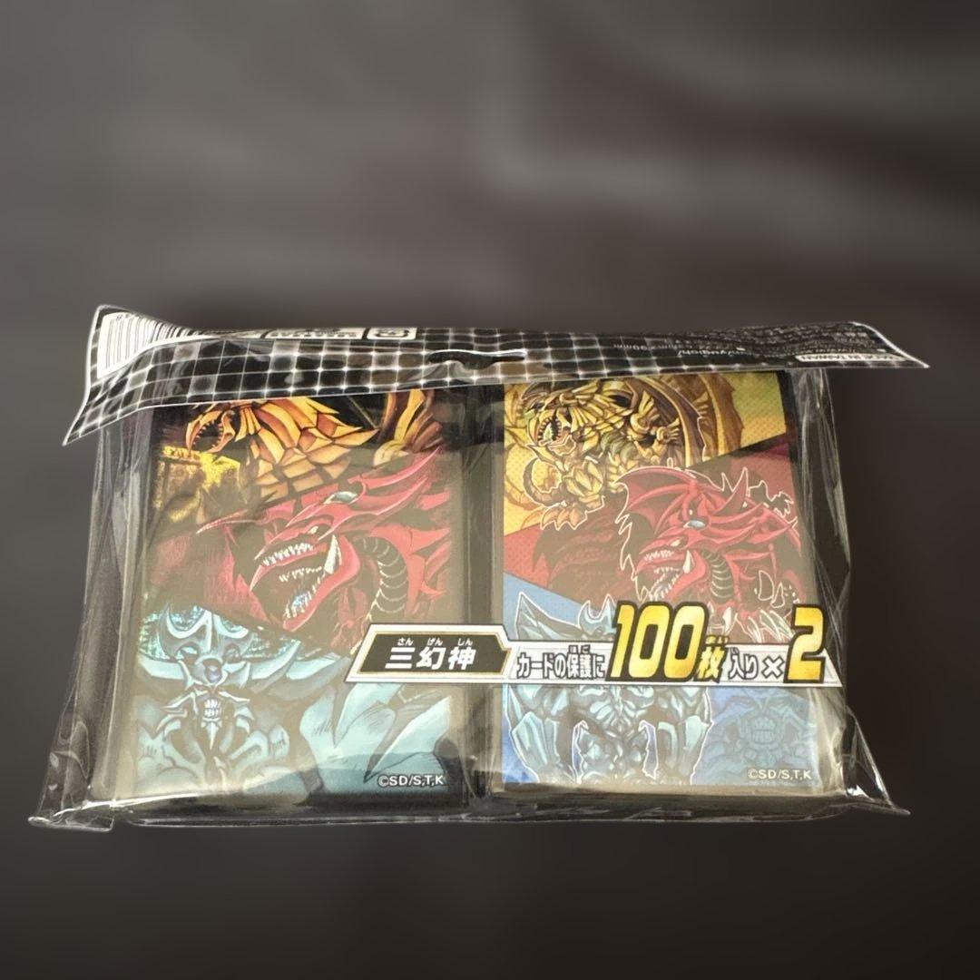 遊戯王 三幻神未開封スリーブ - メルカリ