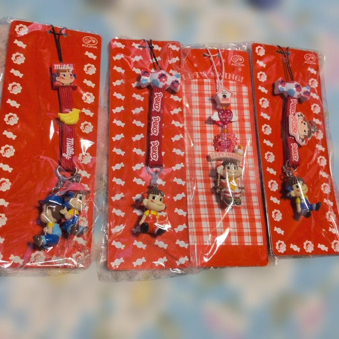 ペコちゃんストラップセット - メルカリ