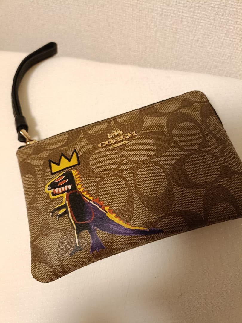 カ*ヌ様 COACH 恐竜イラスト付きポーチ