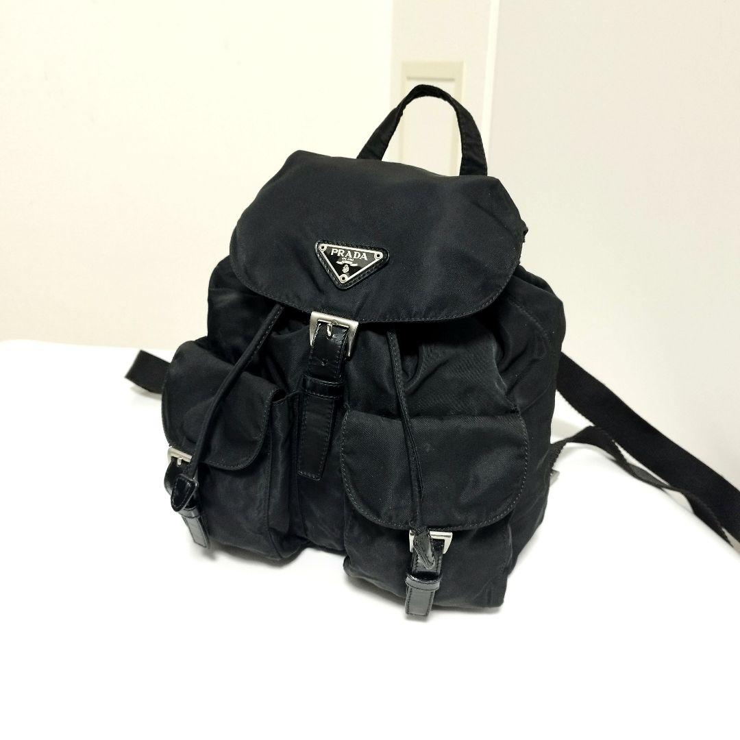 美品☆　プラダ　リュック　ベルト　フラップ　三角ロゴプレート　レザープレート