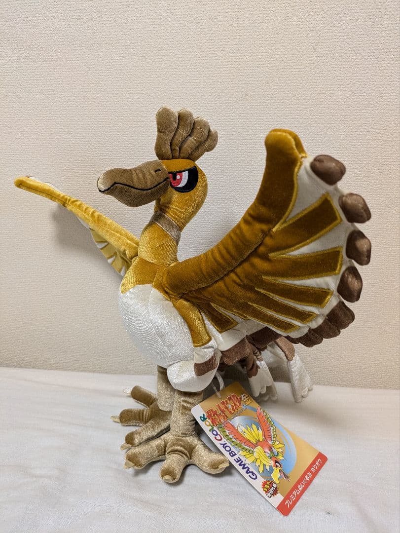 プレミアムぬいぐるみ ホウオウ金 ポケモンセンター - メルカリ