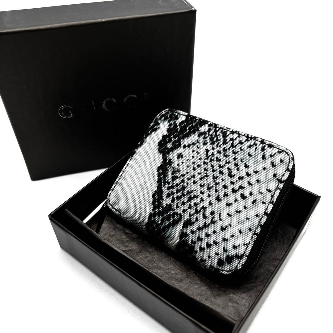 未使用保管品 グッチ コインケース パイソン柄 ラウンドジップ ブルー