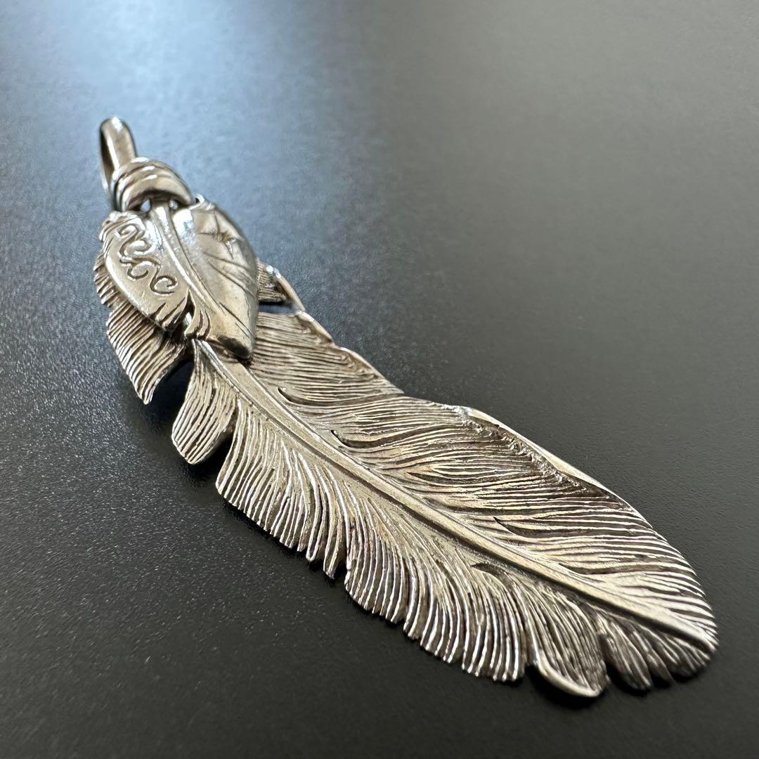 SAAD シルバー サンシンボル ハート フェザーペンダント - メルカリ