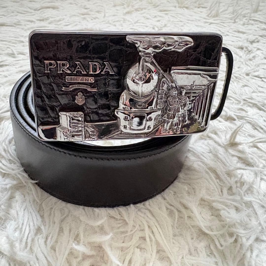 良品 PRADA プラダ レザーベルト 機関車プレート 05379 黒 銀 - メルカリ