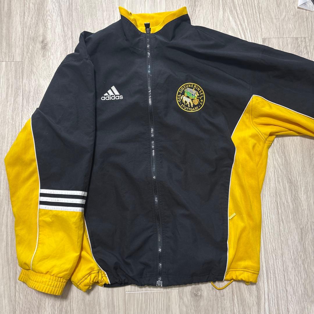 adidas ナイロンジャケット M 黒/黄 - メルカリ