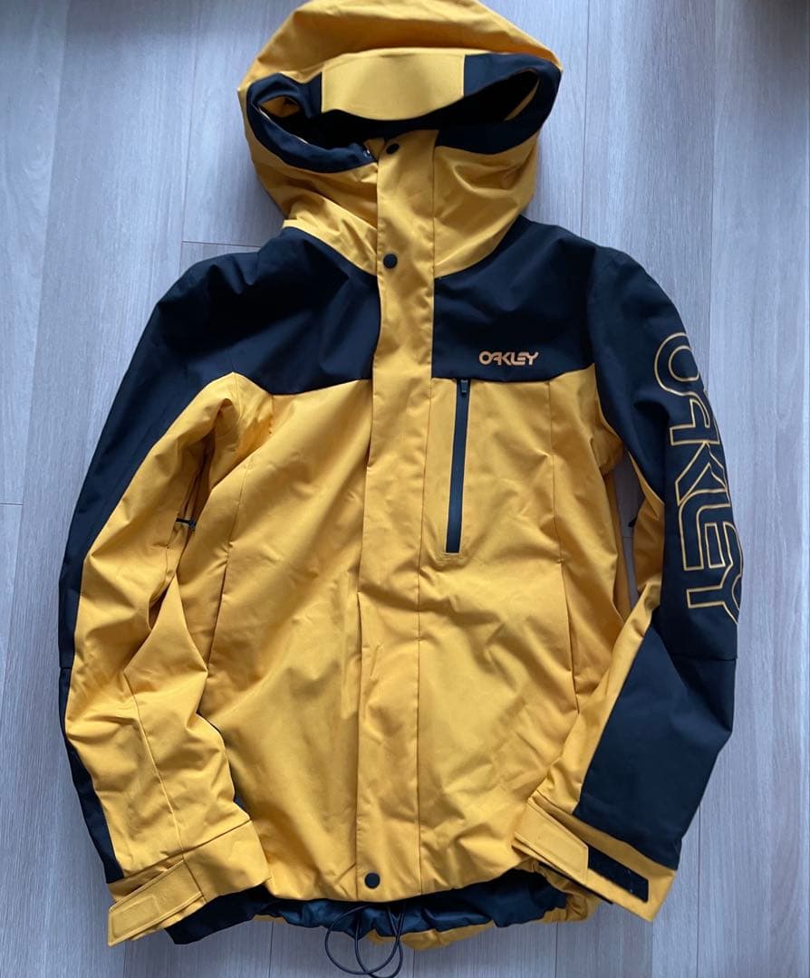 オークリー　スノーボードウェア　ジャケット　ブラック　イエロー　2023-24
