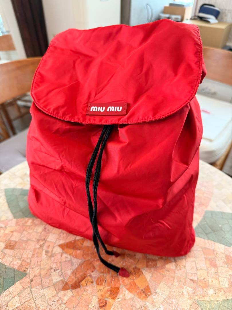 MIU MIU レッドバックパック
