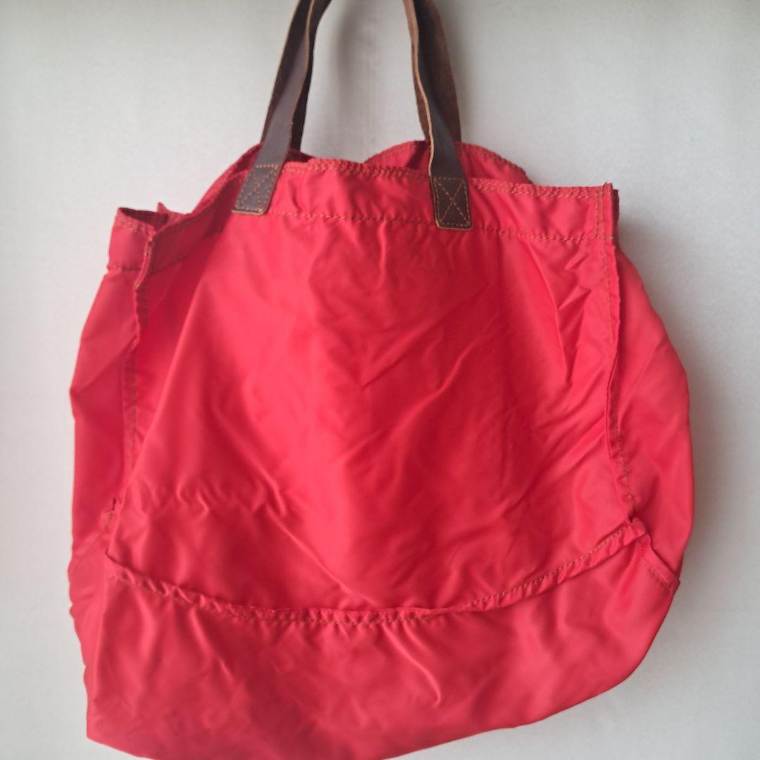 j*5様 tricot COMME des GARCONS 赤いナイロンバッグ